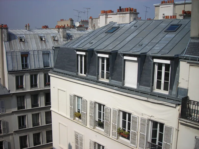 Beneath the Rooftops of Paris poster