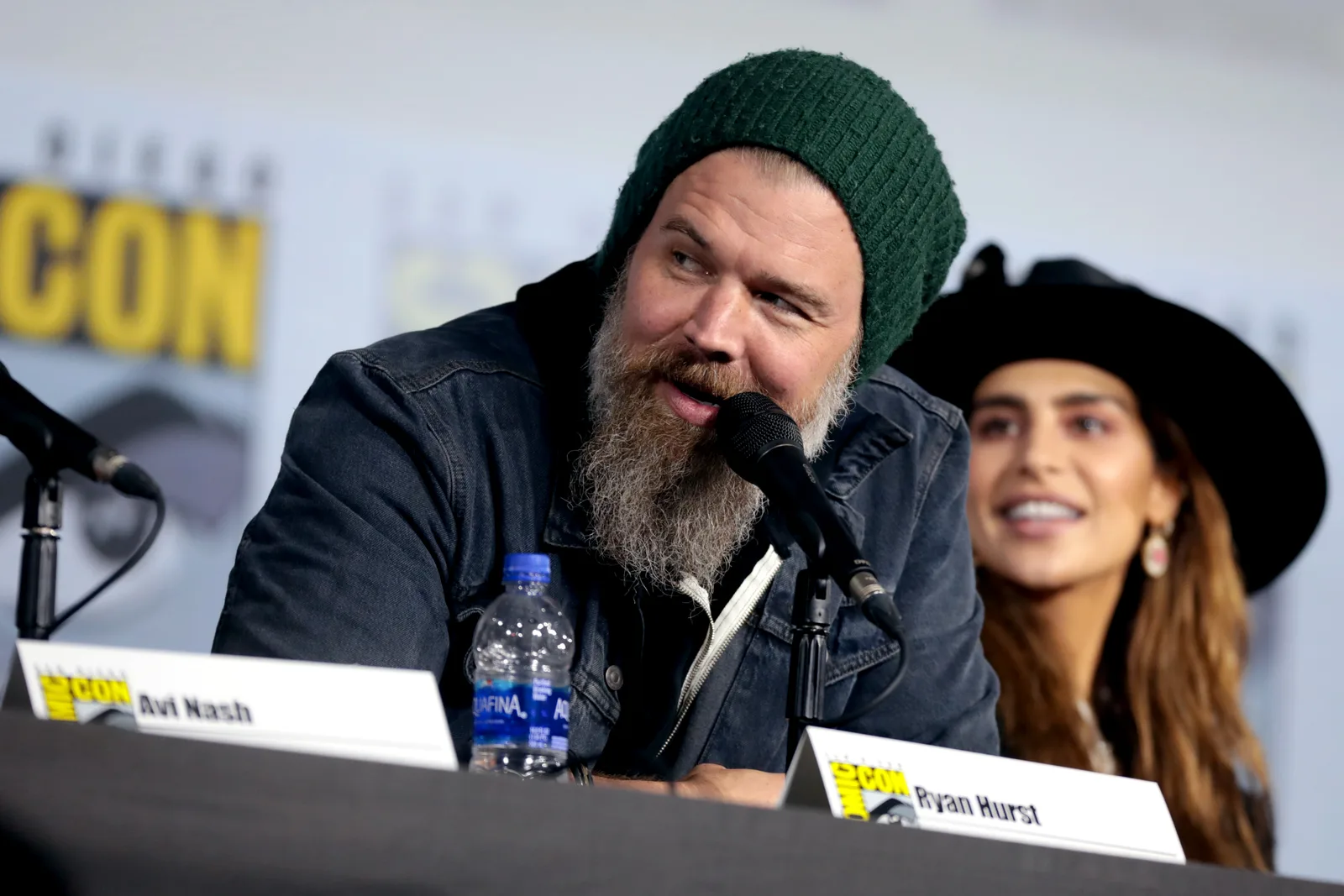 Ryan Hurst speaking into a microphone at a 2019 San Diego Comic-Con panel