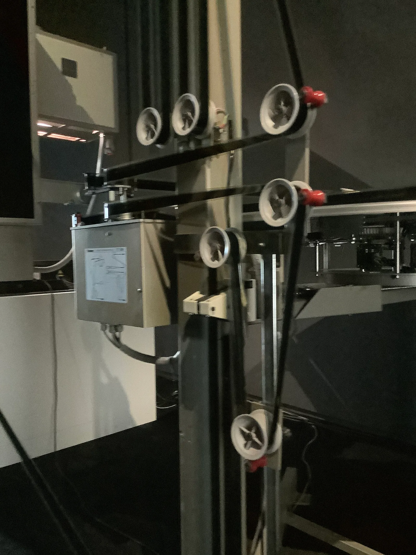 Film going through an IMAX 15/70 mm Film Projector in the Jeu de Paume in Paris, France.