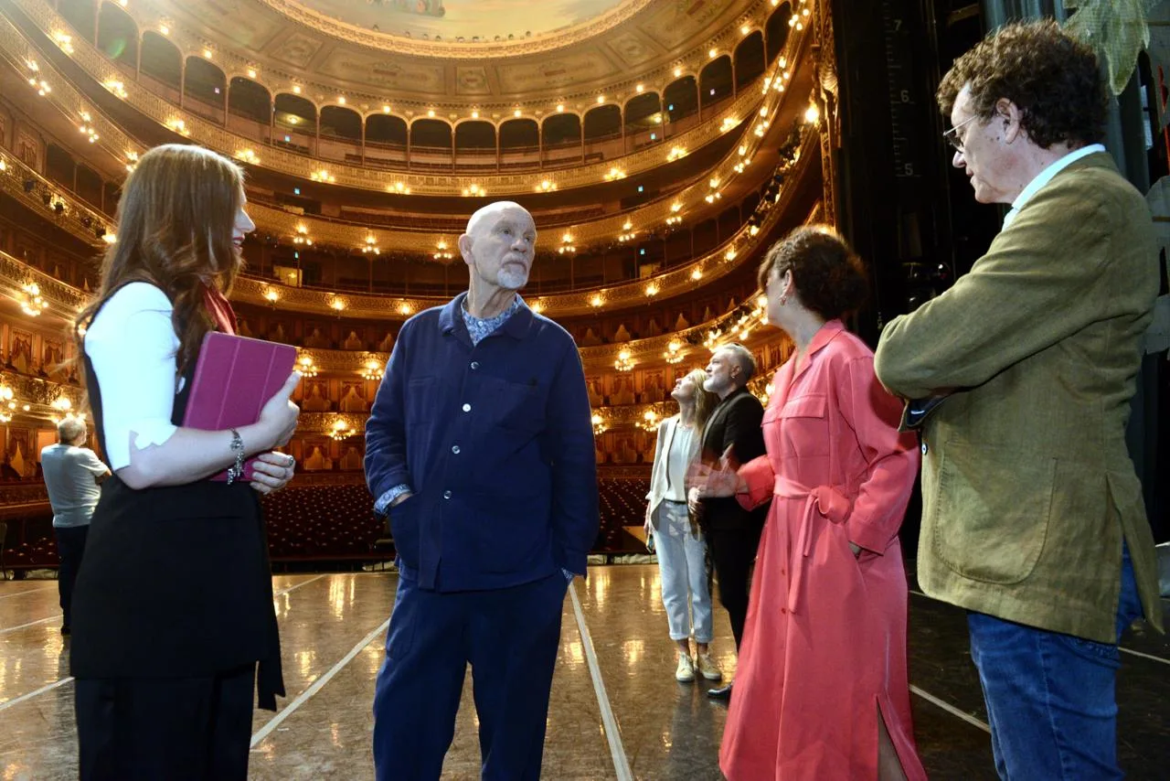 John Malkovich, centre, with others on the stage of the Teatro Colón in Buenos Aires, March 2026