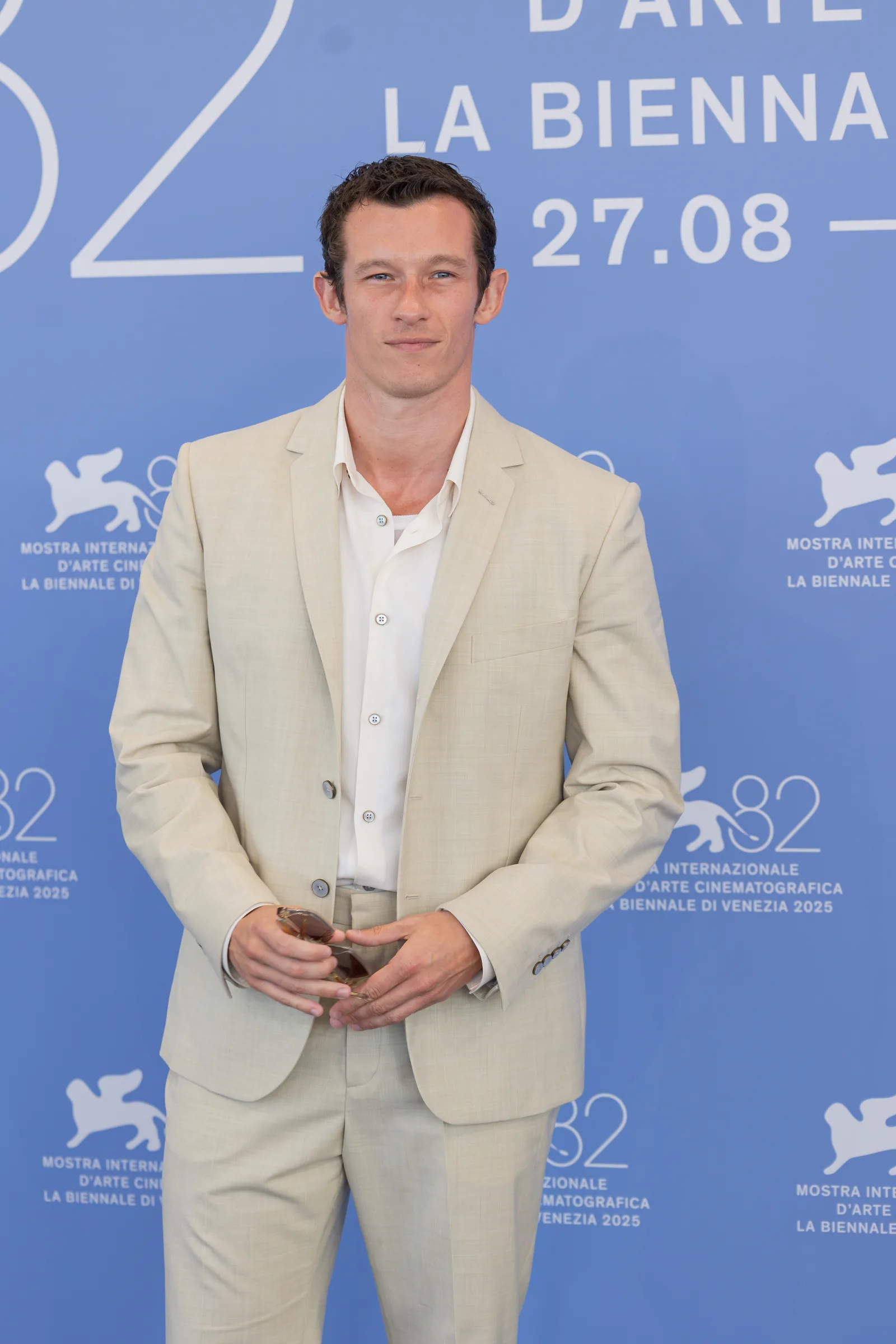 Callum Turner standing on the red carpet at the 82nd Venice International Film Festival