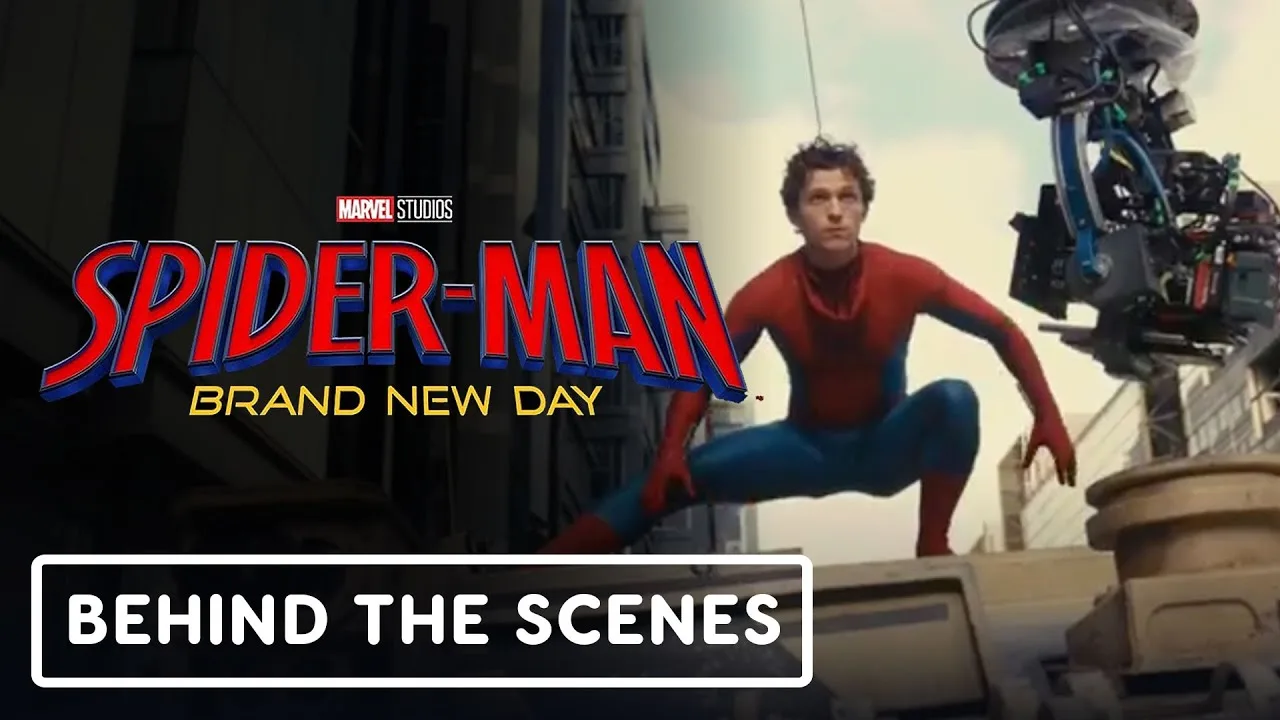 Tom Holland in his Spider-Man suit beside a film camera on the Brand New Day set