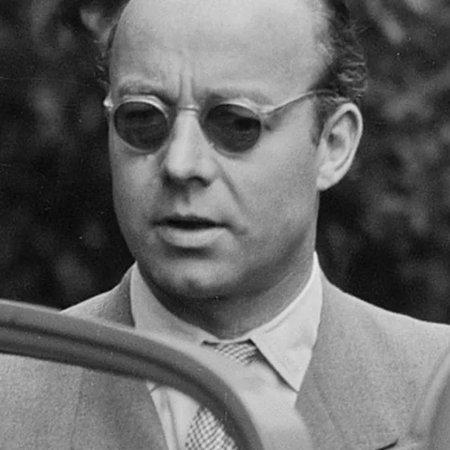 Heinz Rühmann beside a car; Limburg appeared in four films with him.
