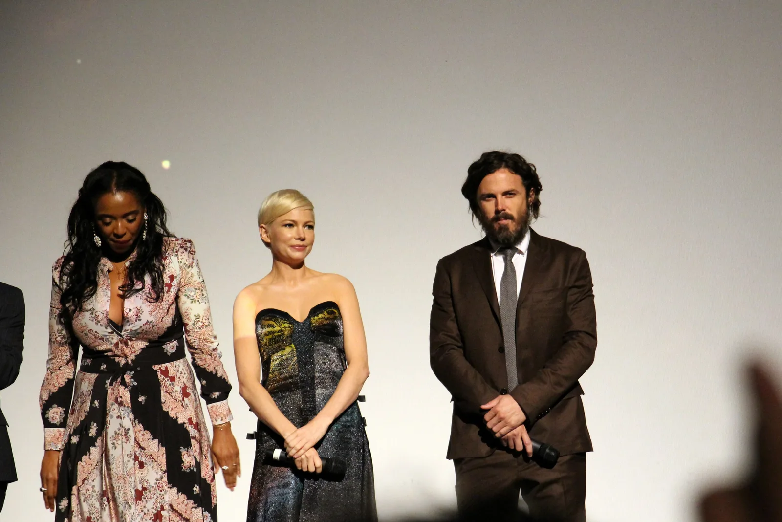 A producer, Michelle Williams and Casey Affleck at the Manchester by the Sea premiere