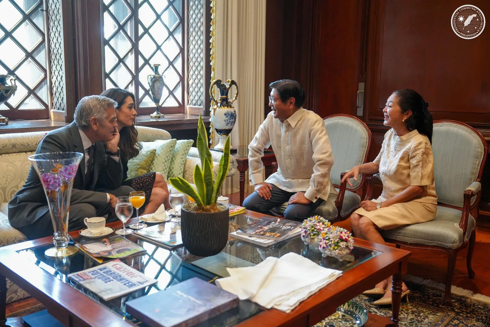 President Ferdinand R. Marcos Jr. met with world-renowned actor George Clooney and his wife, Amal Clooney, an international human rights lawyer, during a courtesy call at Malacañan Palace on Friday.