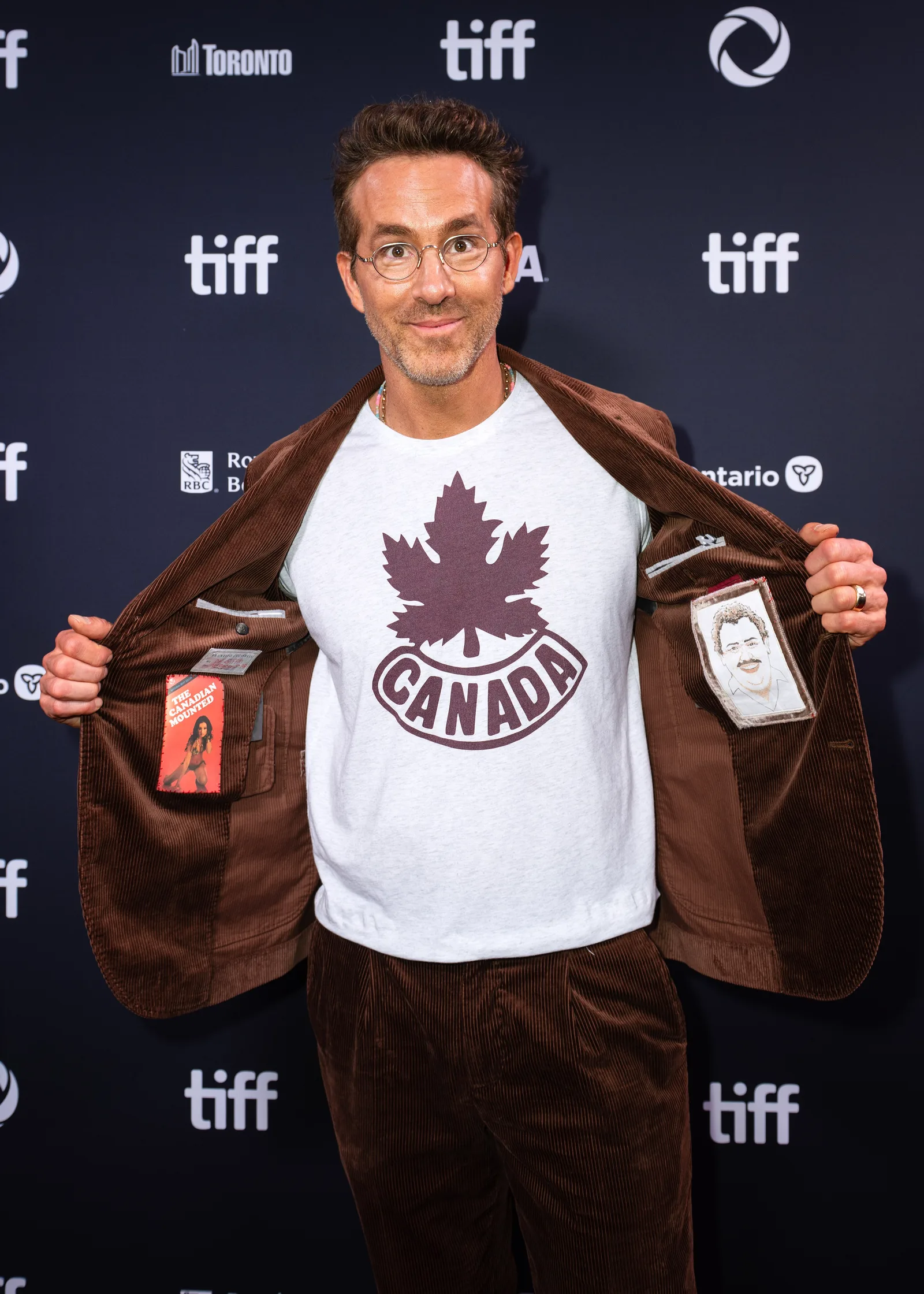 Ryan Reynolds shows off a John Candy Inspired suit at the 2025 Toronto International Film Festival