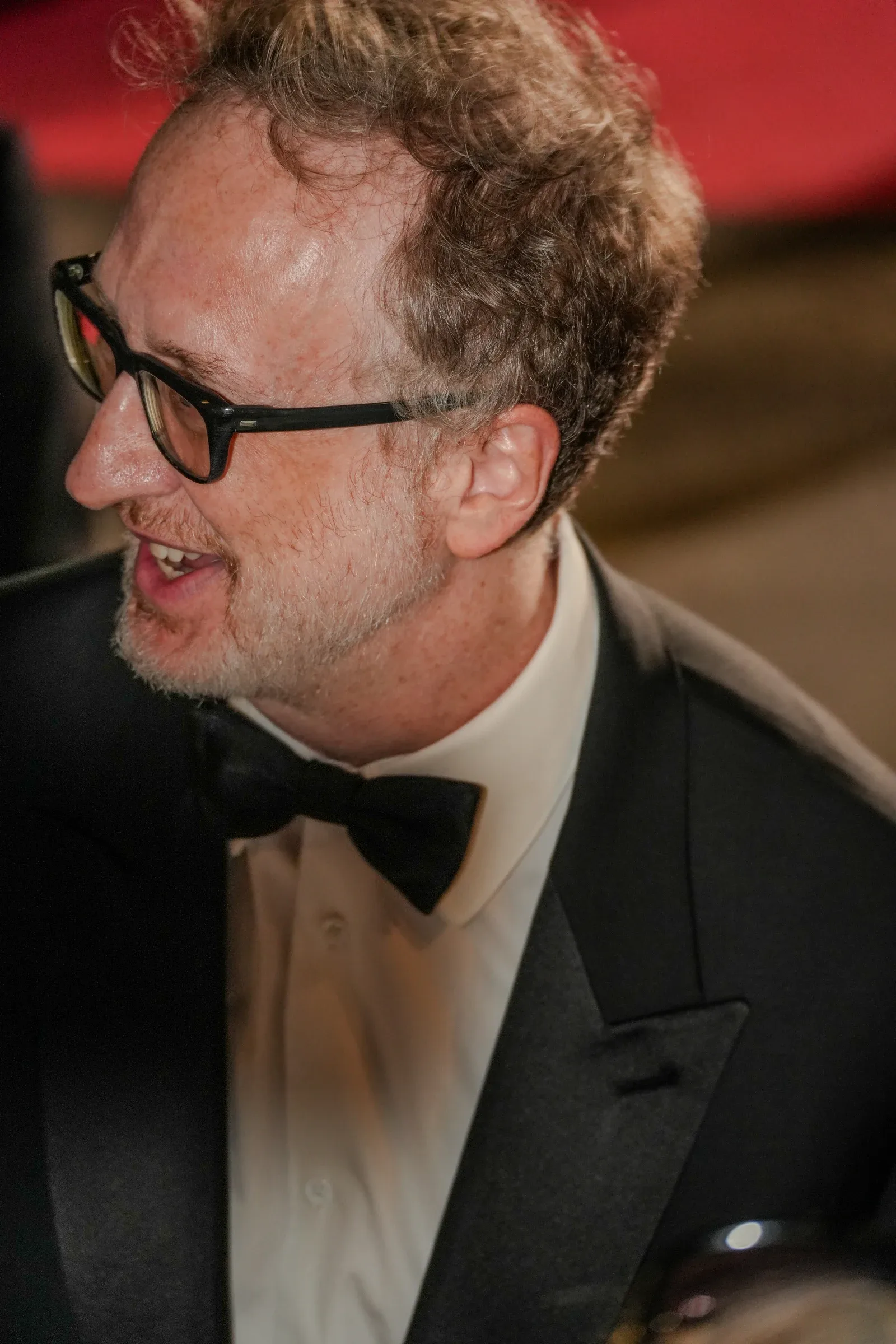 James Gray in glasses and a tuxedo at the 2026 Cannes Film Festival